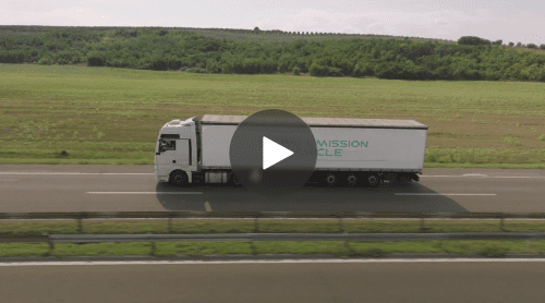 Video thumbnail of a box truck driving and a play button overtop
